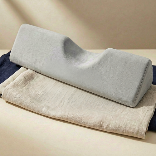 Ergonomic cervical memory-foam neck pillow in grey