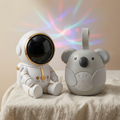 Nursery Sleep Set — koala soother and astronaut projector